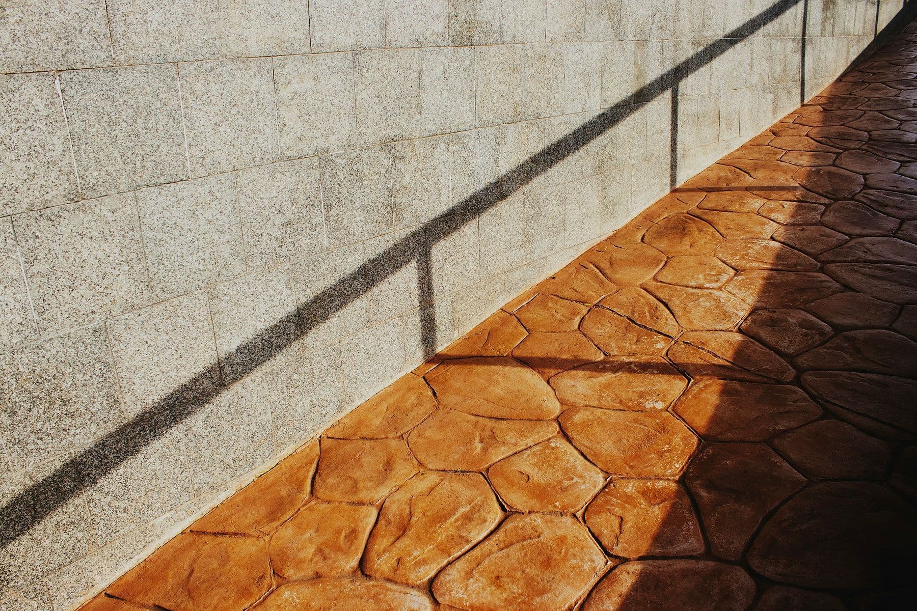 Stamped Concrete Patios: What They Cost, How They Wear, and When They Beat Pavers