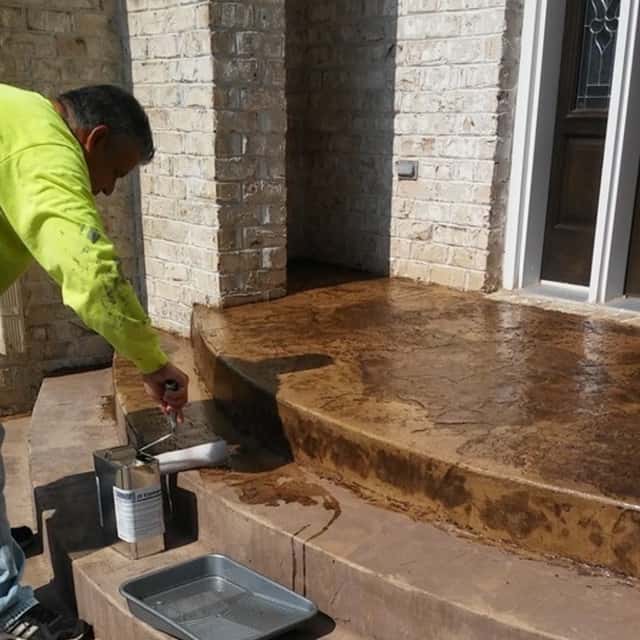 Applying color and sealer to stamped concrete front steps and a rounded porch landing — JFC Concrete LLC, Indianapolis, IN